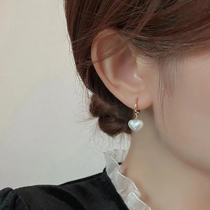 Boucles d'oreilles pendantes en forme de cœur en perles